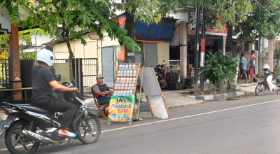 Jasa Penukaran Uang Pinggir Jalan Mulai Bermunculan di Lamongan, Ini Lokasinya