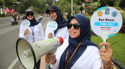 Cara Unik Sosialisasi Pembayaran PBB di Surabaya