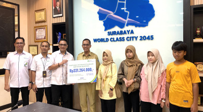 Ahli Waris Pegawai Bappeda Surabaya Terima Santunan JKK Rp220 Juta