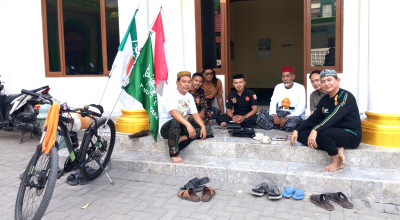 Kisah Ndan Arif, Kader Banser yang Gowes 14 Hari ke Muktamar NU Jombang