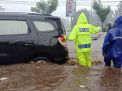 Jalan Raya Malang-Surabaya Lumpuh Akibat Banjir