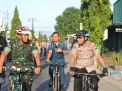 Bersepeda, Kapolres dan Dandim Ponorogo Pantau Keamanan Usai Coblosan