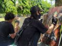 Ingatkan Warga Jaga Prokes, Para Seniman Lukis Pahlawan Bermasker