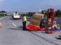 Truk Muat Mesin ATM Terguling di Tol Gempas, Sopir Terluka