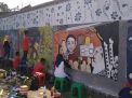 Kurangi Kesan Angker, Tembok Pemakaman Umum Dipercantik dengan Mural