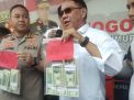 Polisi Tangkap Pengedar Dolar AS Palsu Senilai Rp 1,4 Miliar