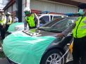 Ajak Warga Cegah Corona, Mobil Polisi di Surabaya Dipasang Masker