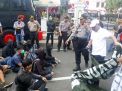 May Day 2019 di Surabaya, Massa Berpakaian Serba Hitam Dibubarkan