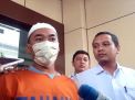 Berbaju Tahanan, PNS Kecamatan Tambaksari Tersangka Rasisme Minta Maaf