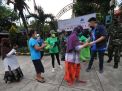 Pengusaha di Surabaya Gandeng TNI Bagikan Seribu Paket Sembako