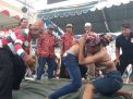 Melirik Tradisi Gulat Okol Sedekah Bumi di Kota Metropolis