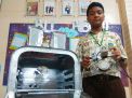 Pelajar SMP ini Ciptakan Alat Pengasapan Ikan Bebas Polusi