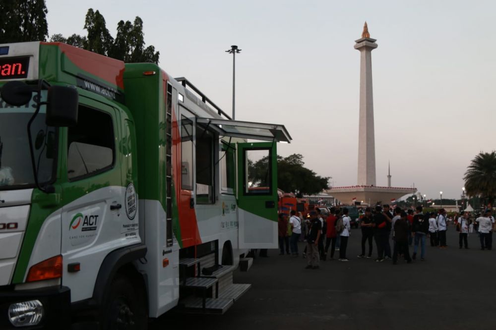 ACT membagikan ribuan makanan gratis bagi kegiatan 'Pawai Obor