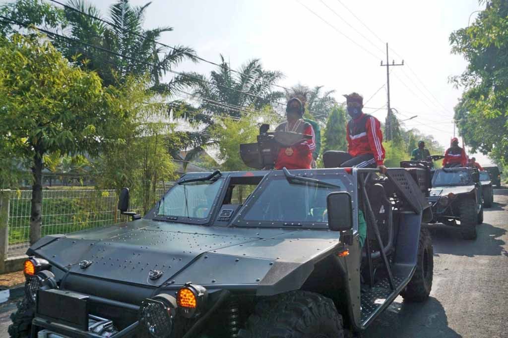 Pulang, Atlet Marinir PON XX Papua Diarak dengan Kendaraan Tempur ATAV