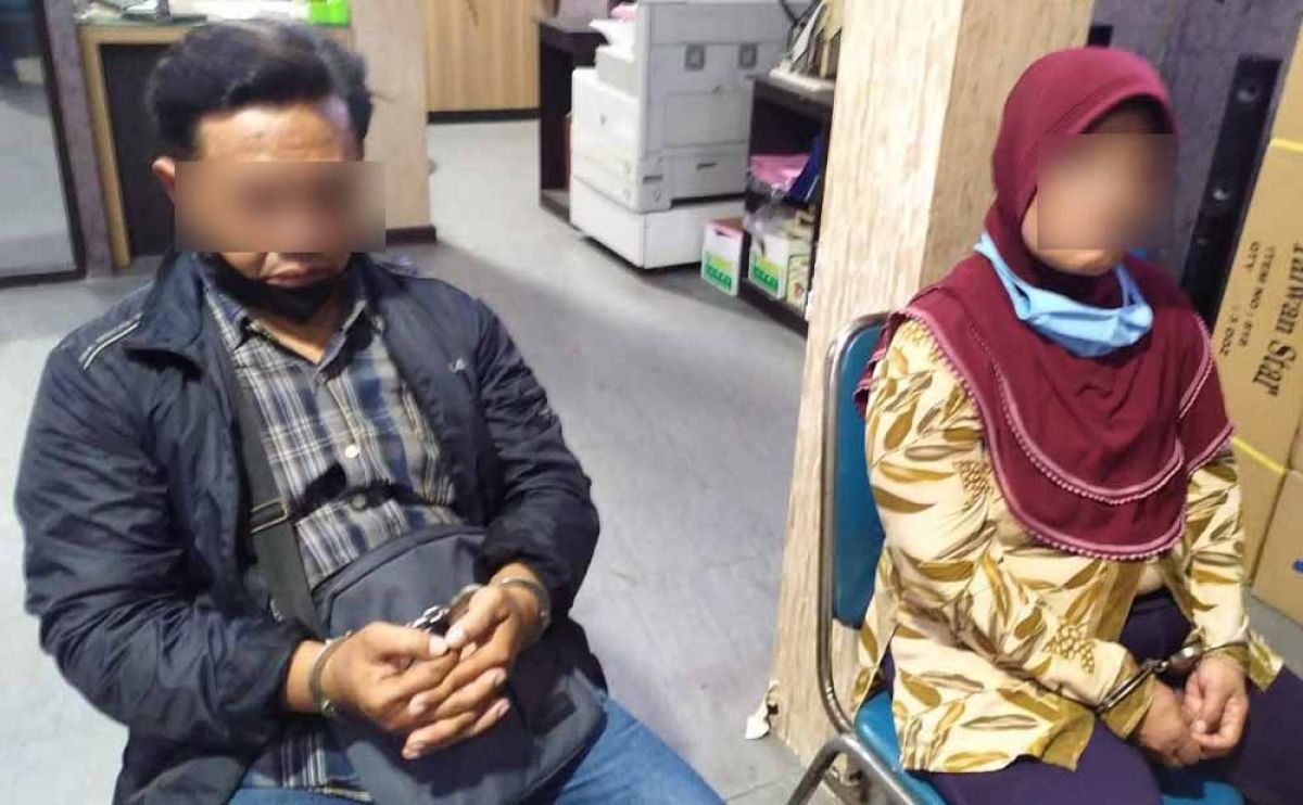 Pasutri pencopet di Surabaya saat diamankan di Polsek Asemrowo. (Foto: Polsek Asemrowo/jatimnow.com)