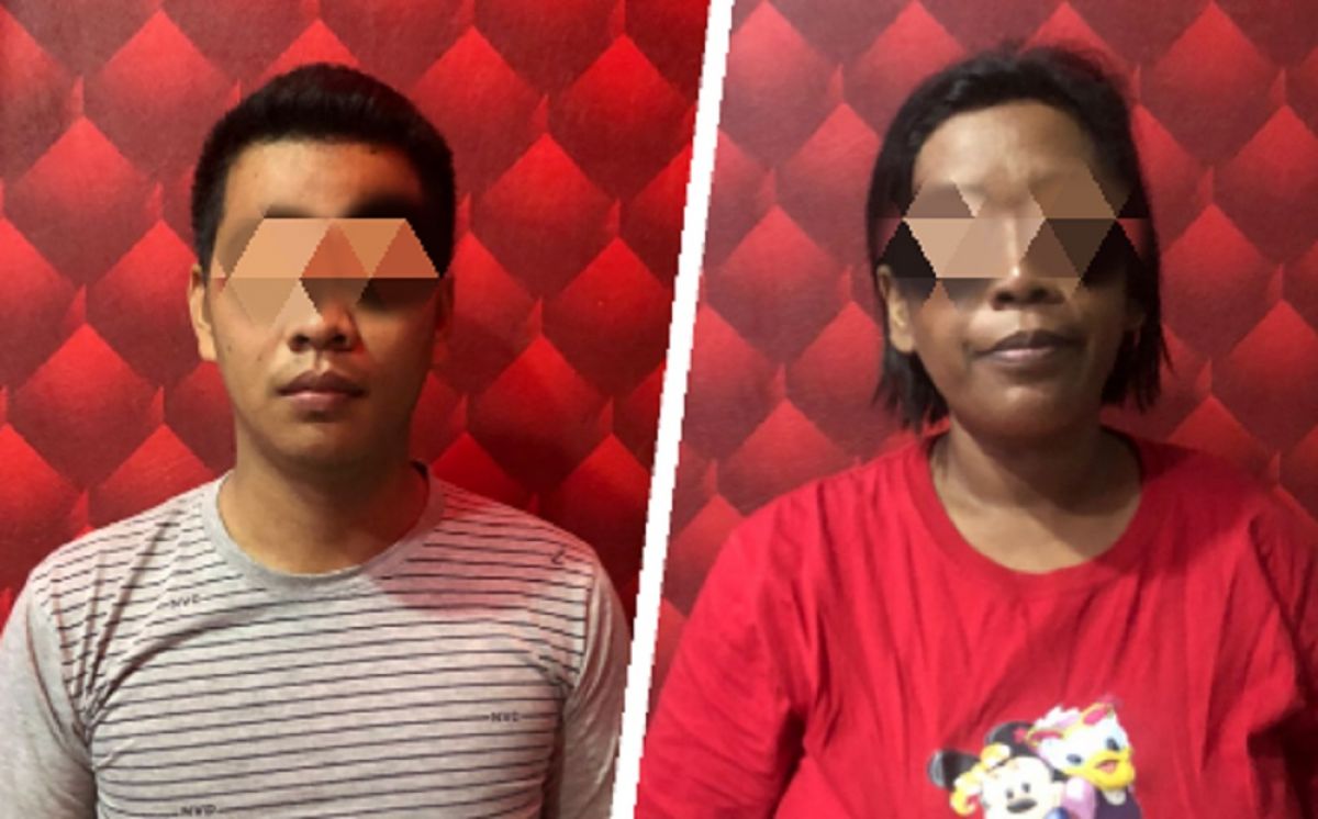 Kedua pelaku penipuan berkedok dukun yang bisa membuka aura positif. (Foto: Satreskrim Polres Mojokerto for jatimnow.com)