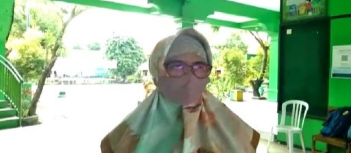 Humas SMPN 1 Kepanjen, Rustini.(Foto: Rizal Adhi Pratama)