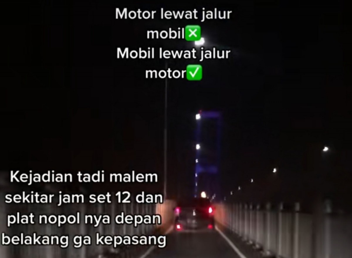 Aksi mobil misterius melintas di jalur motor Jembatan Suramadu (Foto: Tangkapan layar video postingan akun TikTok @kmlfjr06)