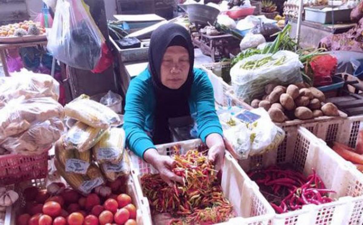 Rohimah, salah satu pedagang di Pasar Sidoharjo Lamongan (Foto: Adyad Ammy Iffansah/jatimnow.com)