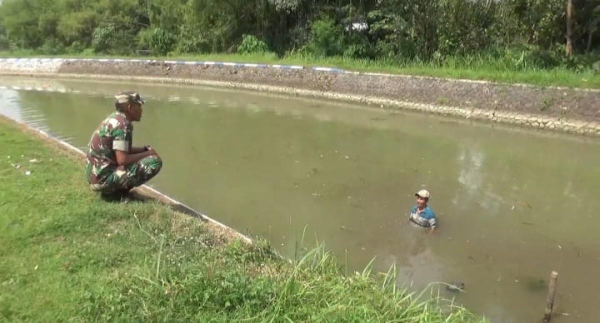 Lokasi tenggelamnya balita di dam Kali Bening, Jombang. (foto: Elok Aprianto/jatimnow.com)