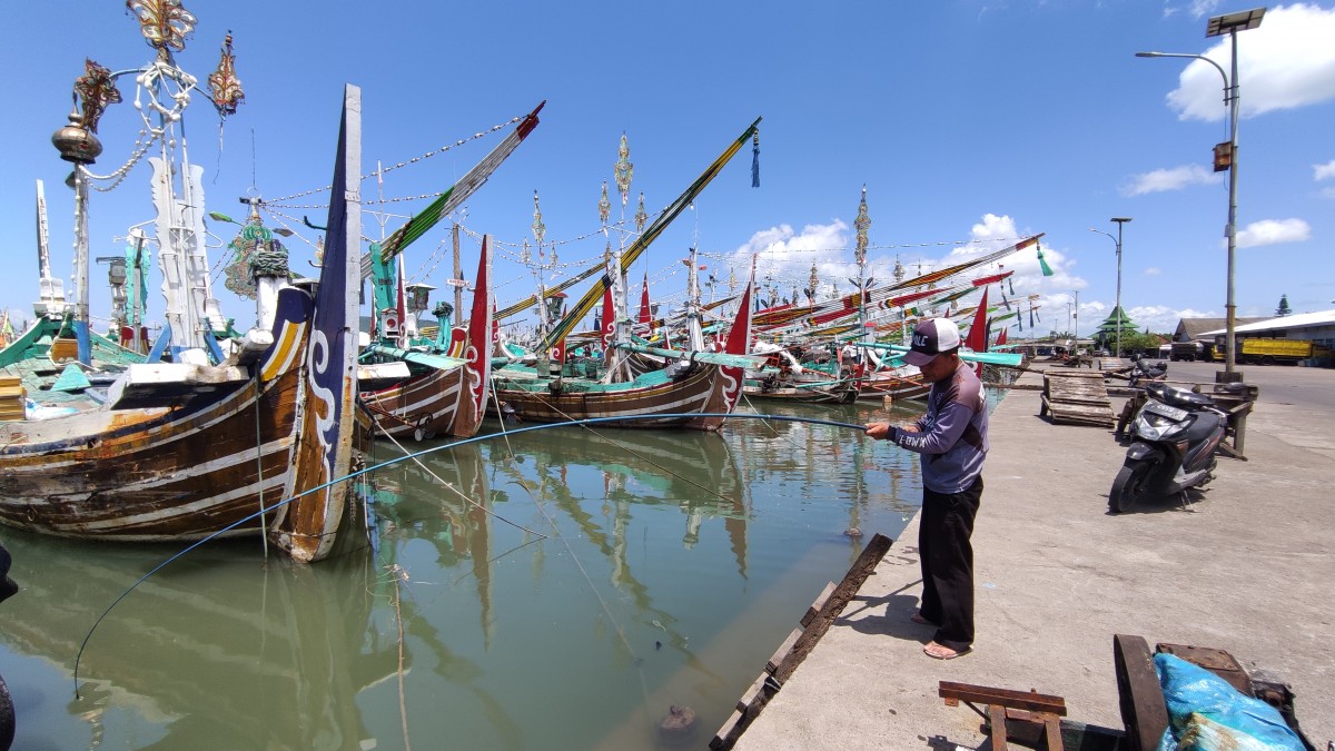 Perahu nelayan bersandar di Pelabuhan Muncar, Banyuwangi. (Foto: Eko Purwanto/jatimnow.com)