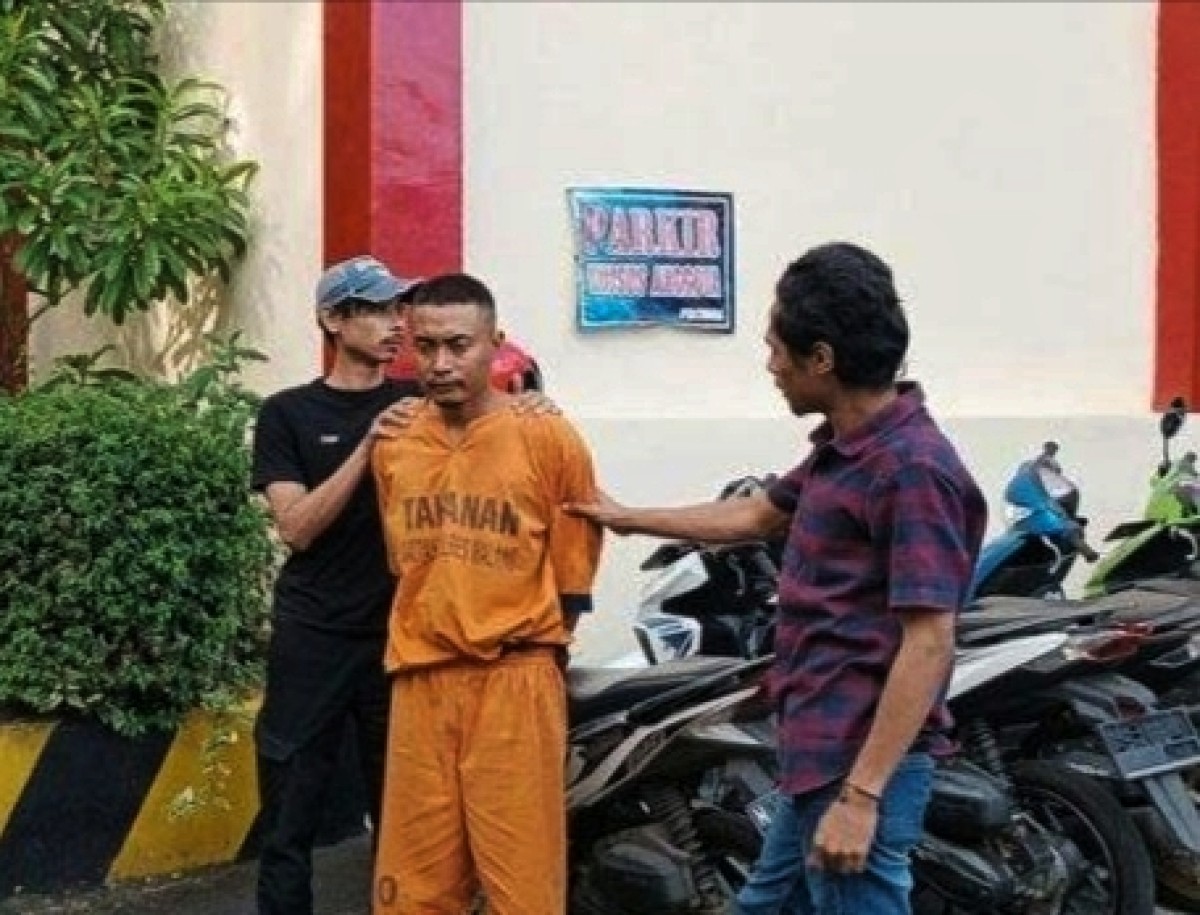 Pelaku saat digelandang di Mapolres Malang. (Polres Malang for jatimnow.com)