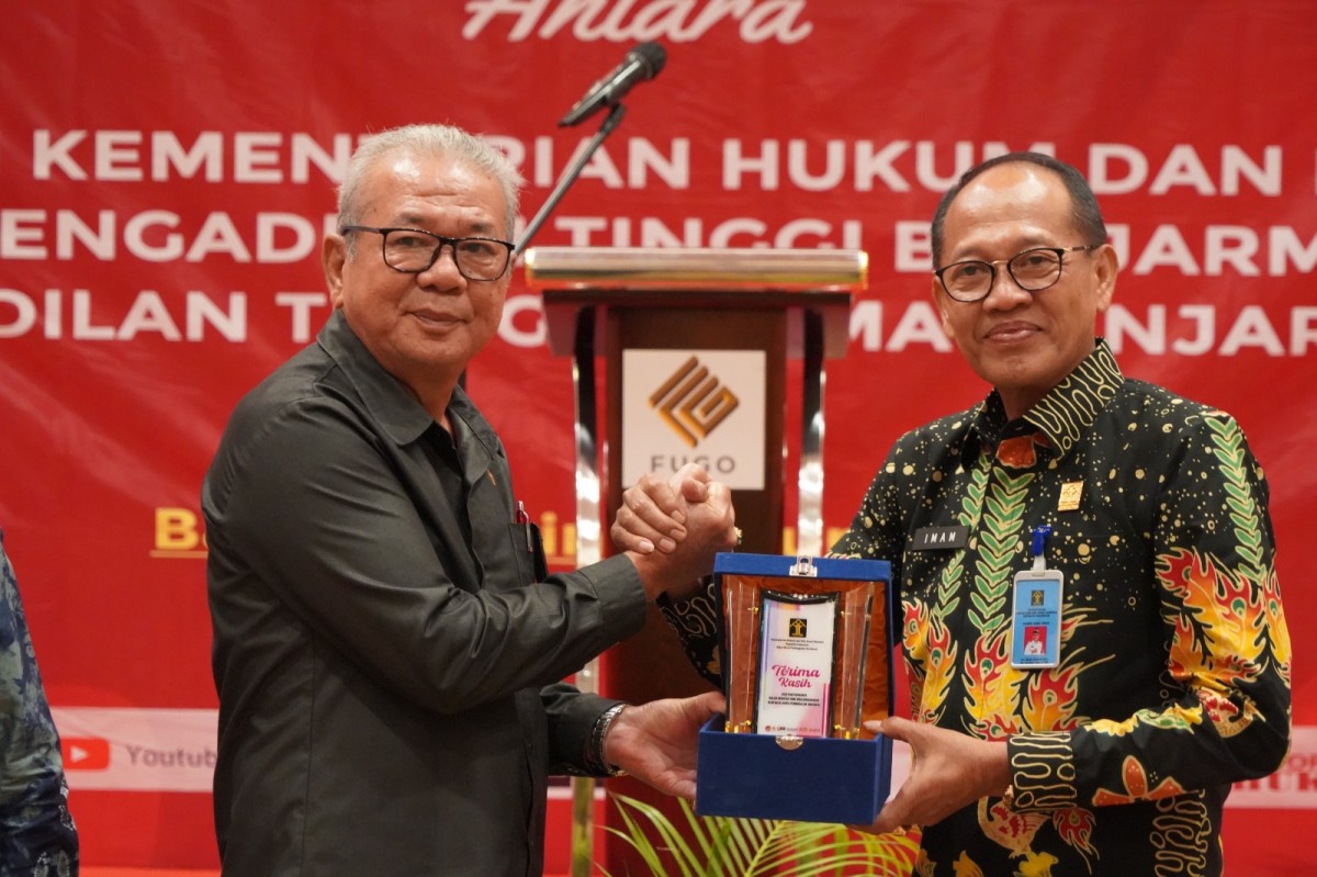 Kanwil Kemenkumham Jatim menandatangani MoU dengan Pengadilan Tinggi Agama Banjarmasin. (Foto: Humas Kemenkumham Jatim)
