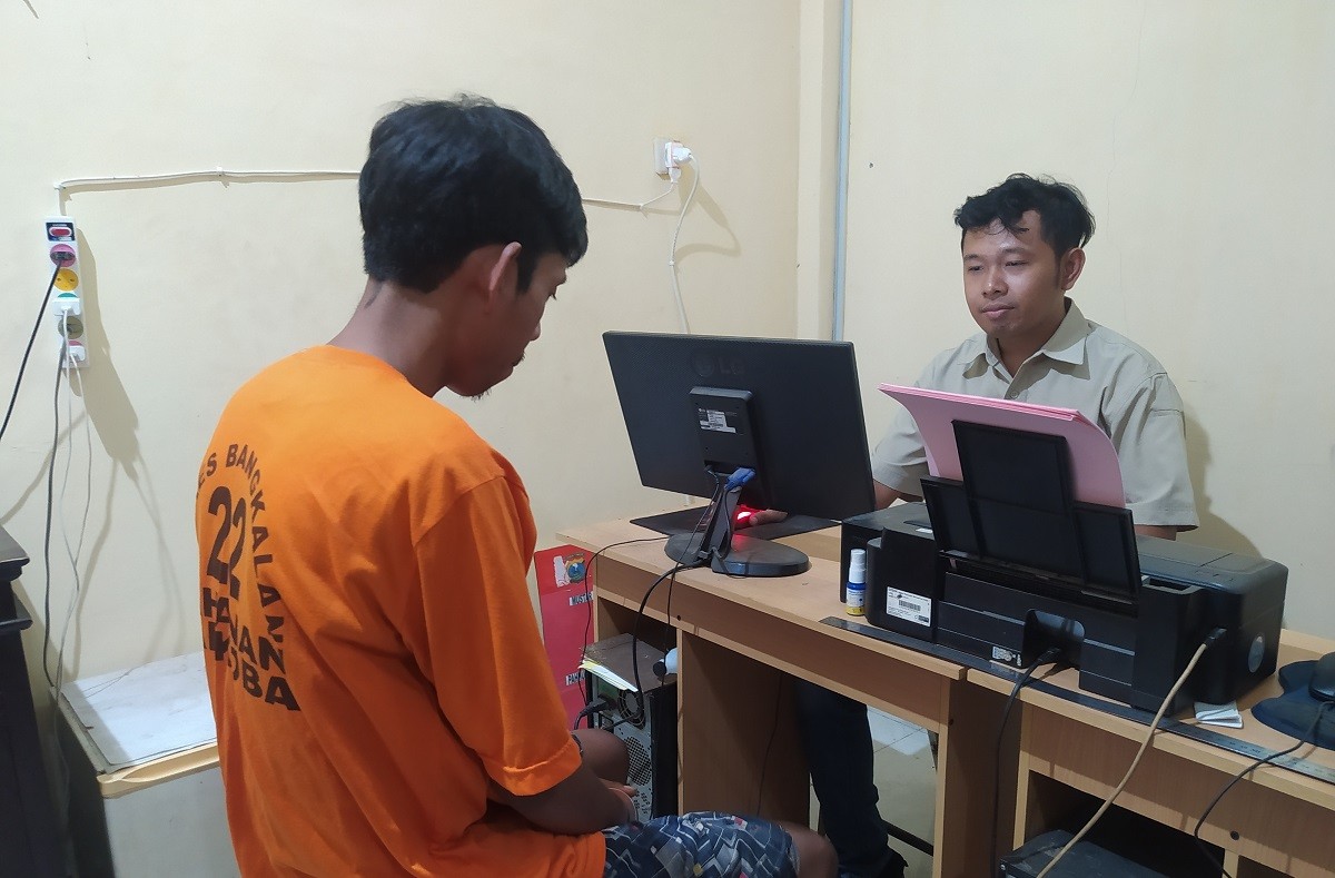 Pelaku usai ditangkap Polres Bangkalan. (Foto: Fathor Rahman/jatimnow.com)