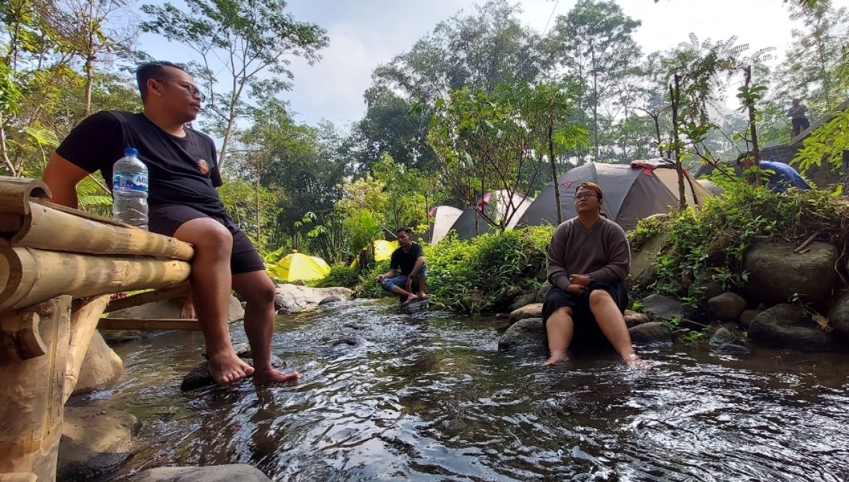Ilustrasi wisatawan menikmati libur di Jatim (foto: Ni'am Kurniawan/jatimnow.com)