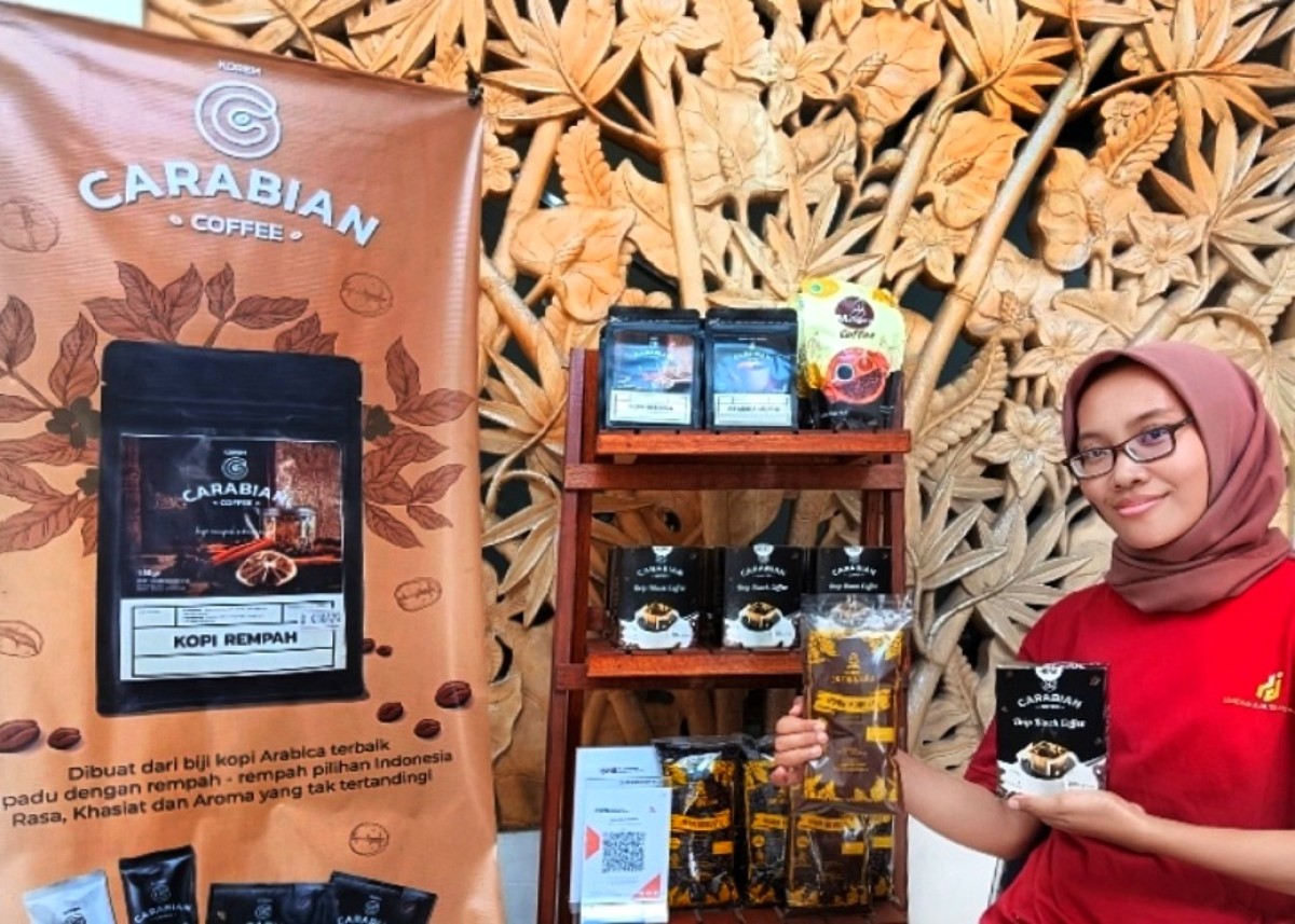 Pemilik usaha Kopi Jenggala, Weni Dwi Agustina. (Foto: Ahaddinii HM/jatimnow.com)