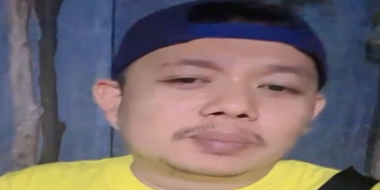 Pria yang menantang polisi jika berani menilang dirinya. (Foto: tangkapan layar media sosial)