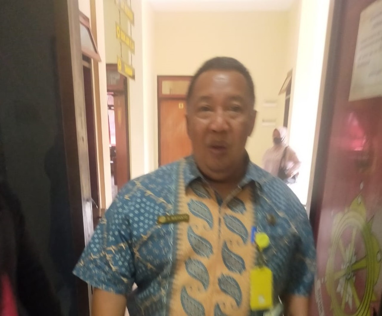 Kepala Seksi Penetapan Hak dan Pendaftaran Badan Pertanahan Nasional (BPN) Kota Batu, R Ristanto Bagoes Pramono saat hendak memberi keterangan di Satreskrim Polres Batu. (Foto : Sunarto for jatimnow.com)