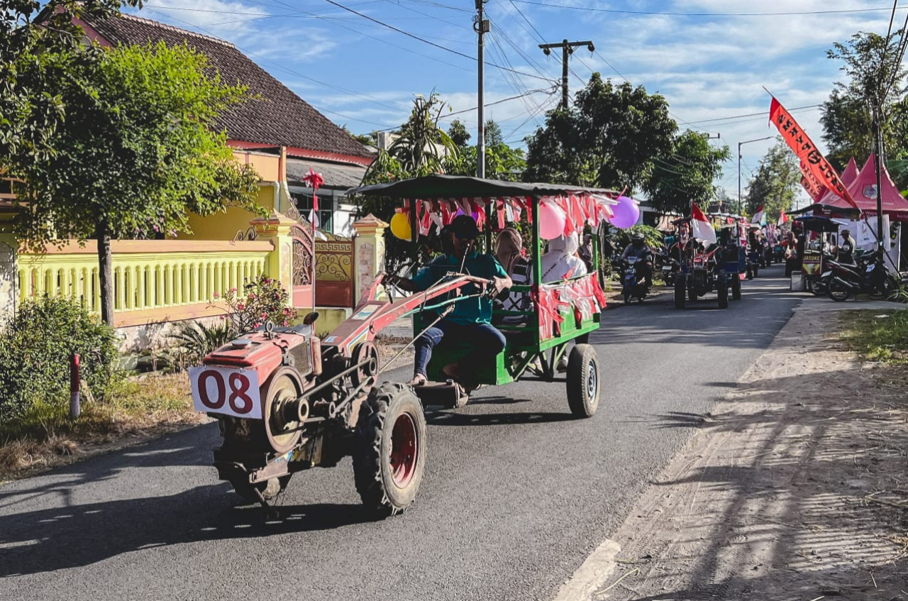 KUD Desa Cakru Jember Gelar Parade Traktor di Hari Koperasi Indonesia