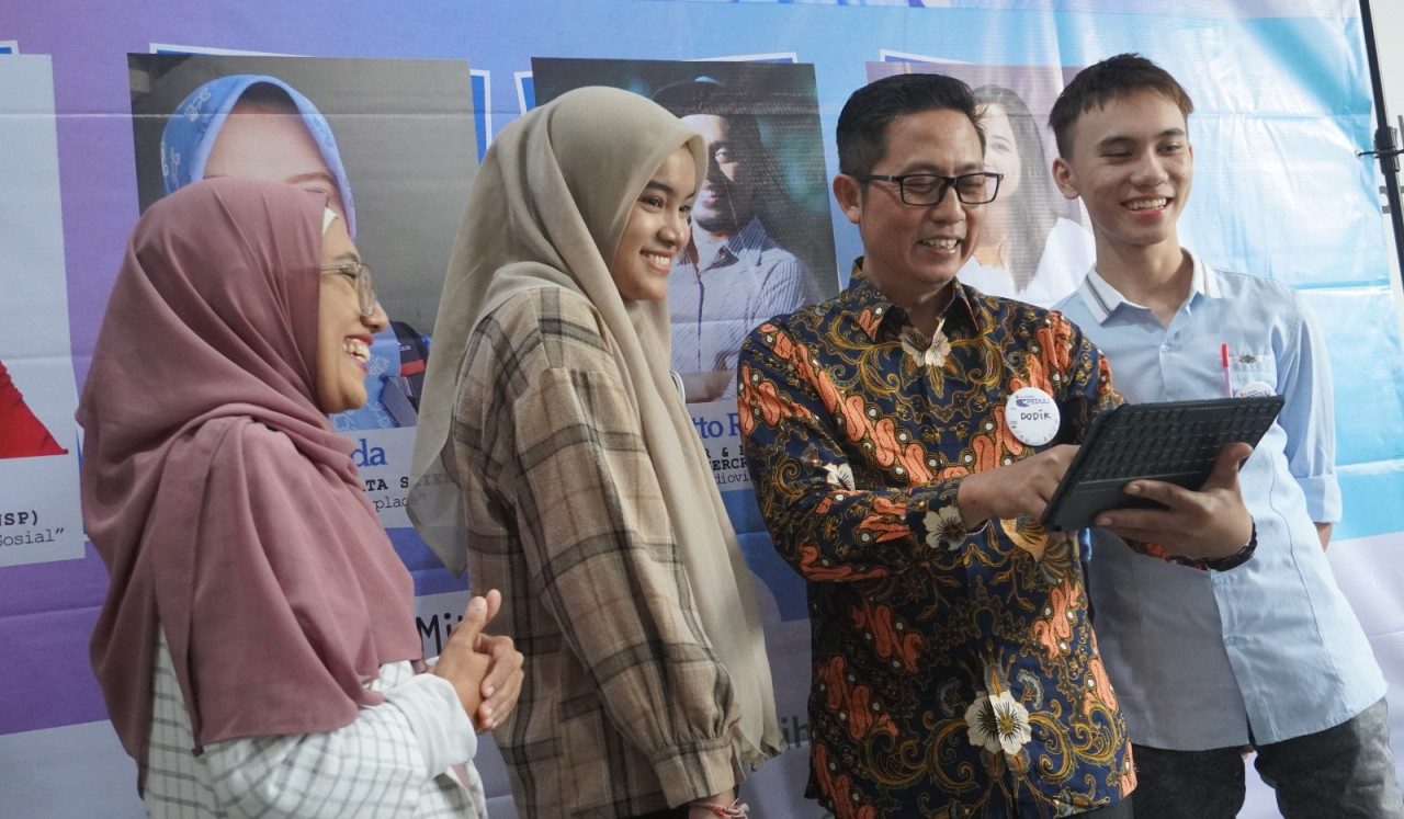 Pelatihan Digital untuk penyandamg disabilitas di Surabaya. (Foto: Xl Axiata for jatimnow.com)