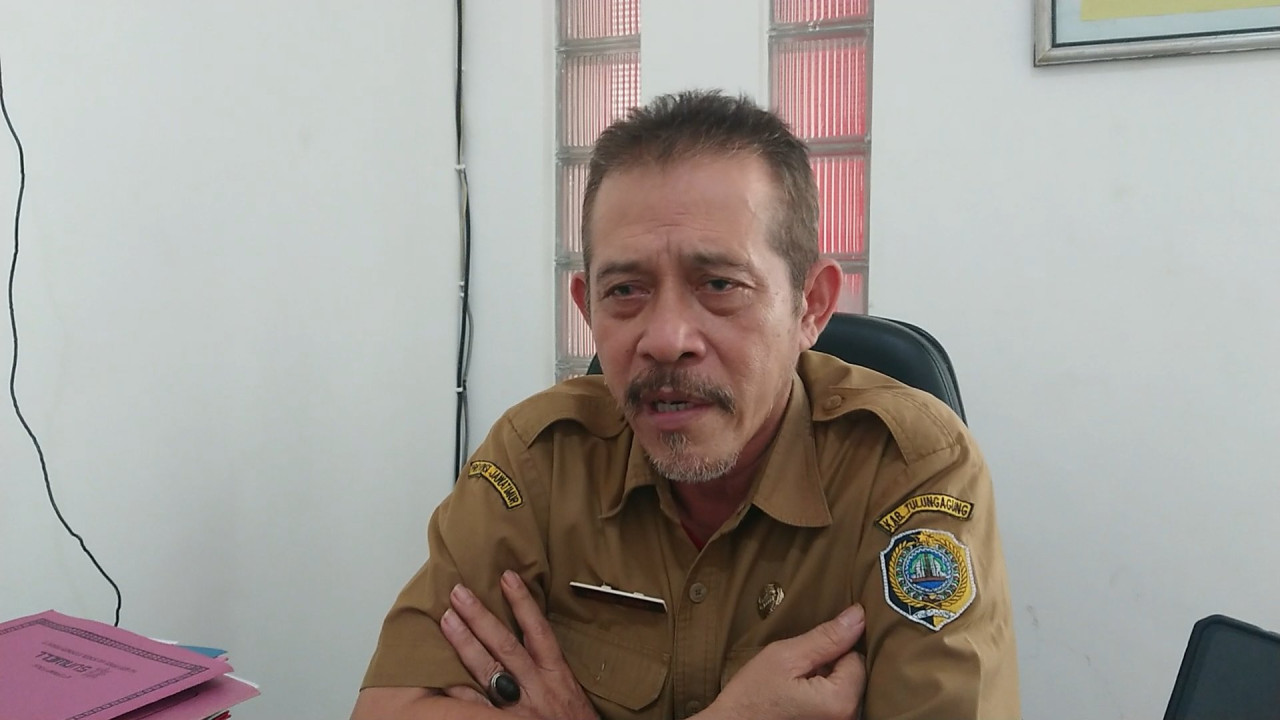 Kepala Dinas Ketenagakrejaan dan Transmigrasi Kabupaten Tulungagung, Agus Santoso. (Foto: Bramanta Pamungkas/jatimnow.com)