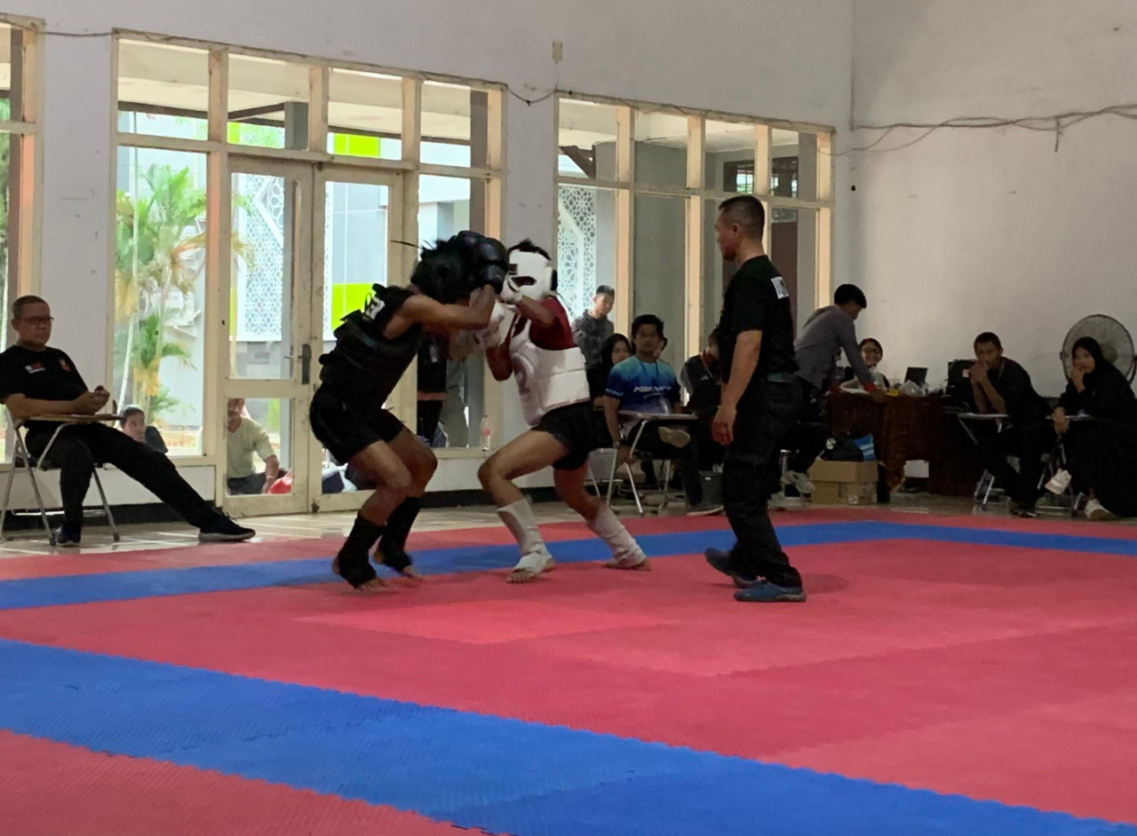 Para peserta tarung bebas beradu ketangkasan. (Foto: Sugianto/jatimnow.com)