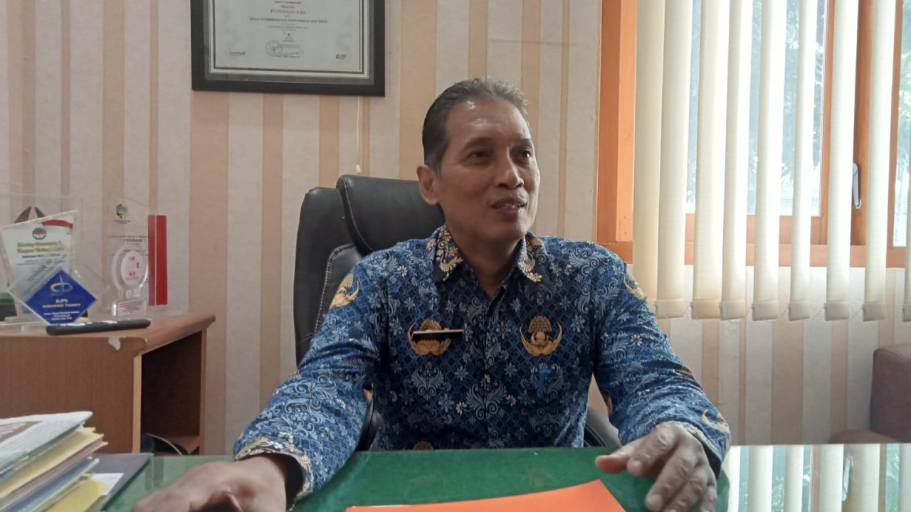 Kepala Dinas Pemberdayaan Masyarakat dan Desa Kabupaten Tulungagung, Iswahyudi. (Foto: Bramanta Pamungkas/jatimnow.com)