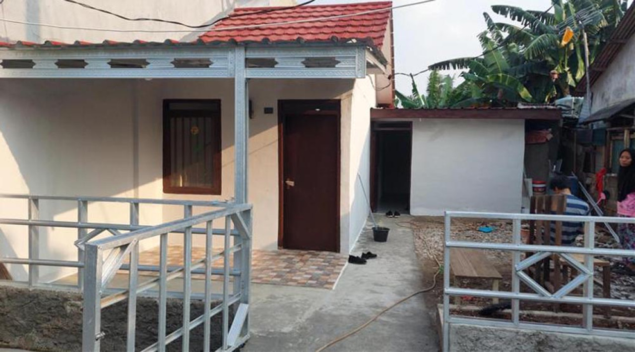 Rumah milik Sumarliyah merupakan istri almarhum Miswadi, pensiunan ASN Direktorat Jenderal Perhubungan Darat, Departemen Perhubungan, usai dibedah. Foto: Dok Bank Mandiri Taspen