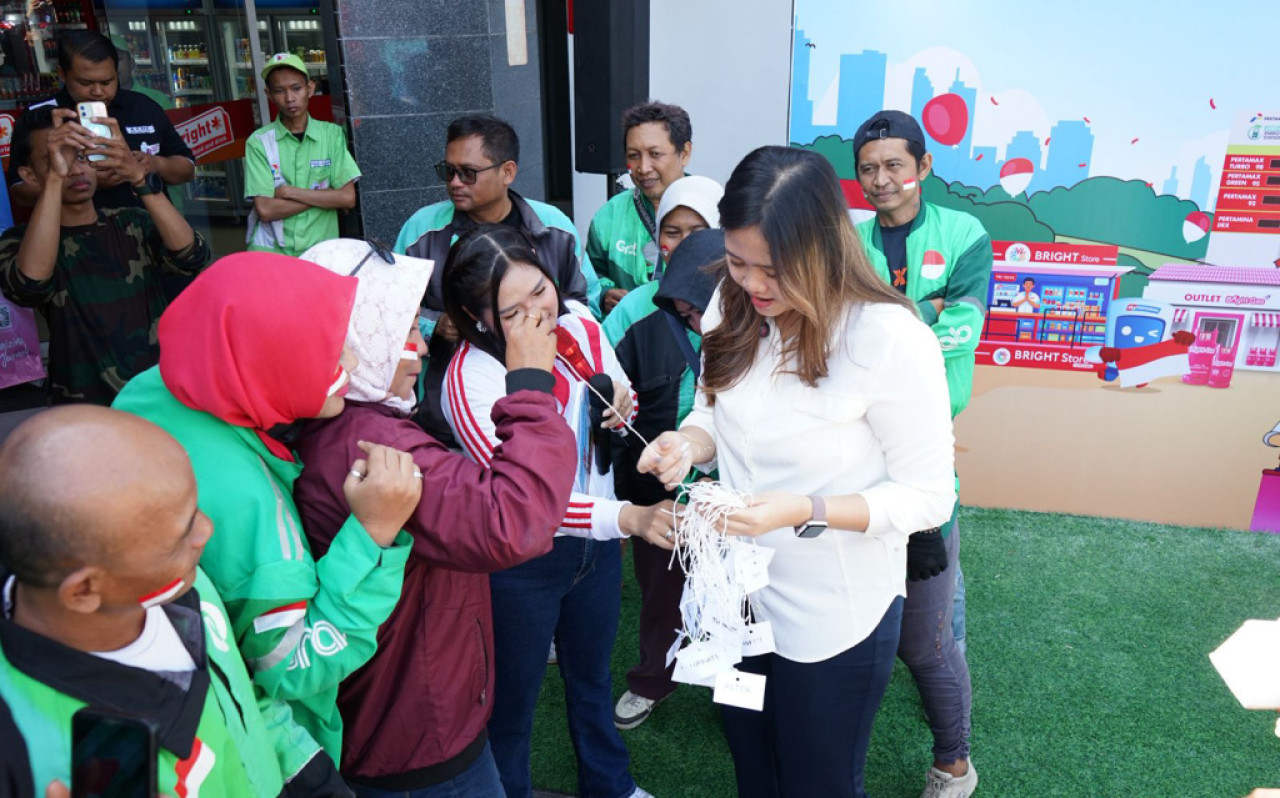 Pertamina Patra Niaga Jatimbalinus Semarakkan HUT ke-80 RI Bersama Komunitas Ojol Surabaya