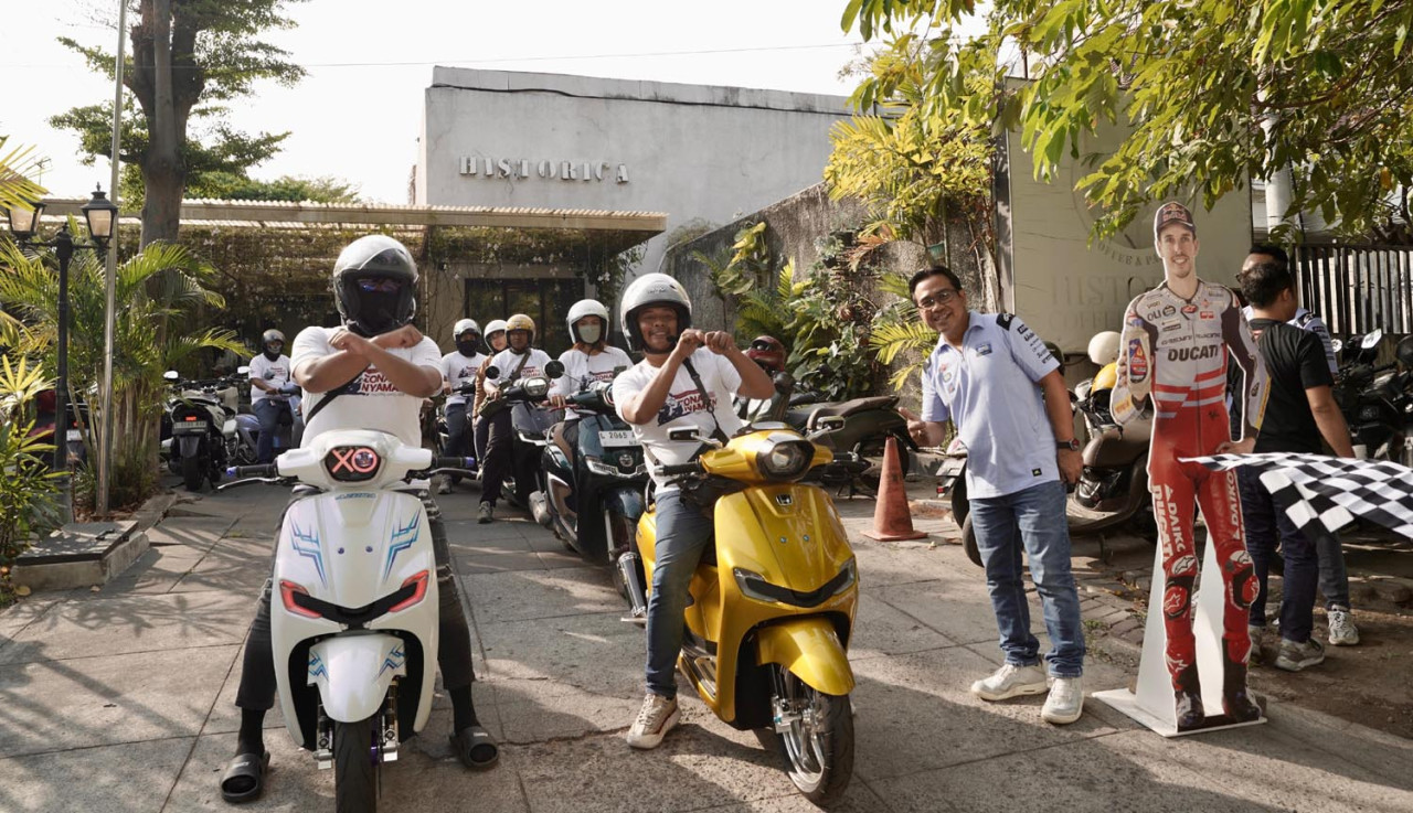 Pengguna motor matic mengikuti city ride menjelajahi rute-rute ikonik di Surabaya. (Foto/JatimNow.com)