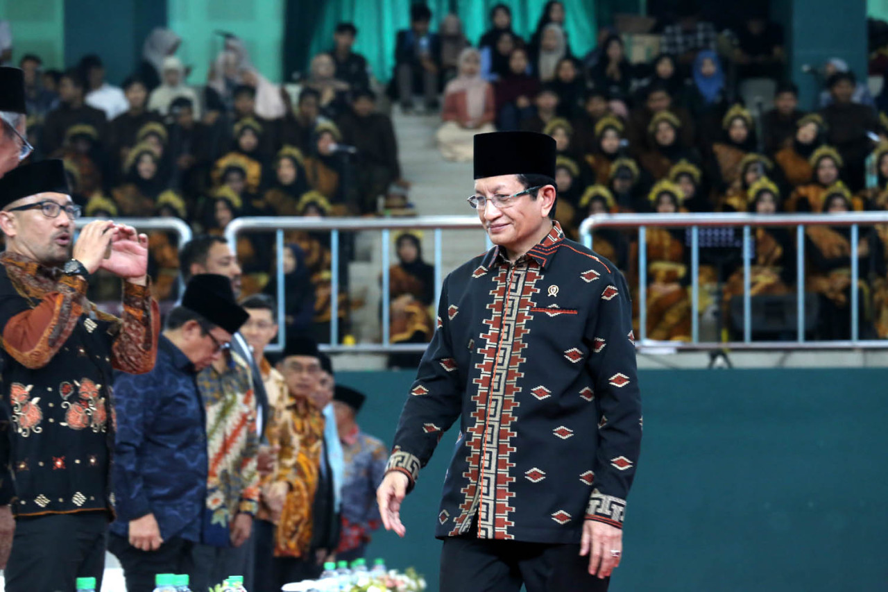 Menteri Agama Nasaruddin Umar usai menyampaikan pidato dalam pembukaan Konferensi Internasional di UIN Sunan Ampel Surabaya, Rabu (26/11/2025). (Foto: Ali Masduki/jatimnow.com)