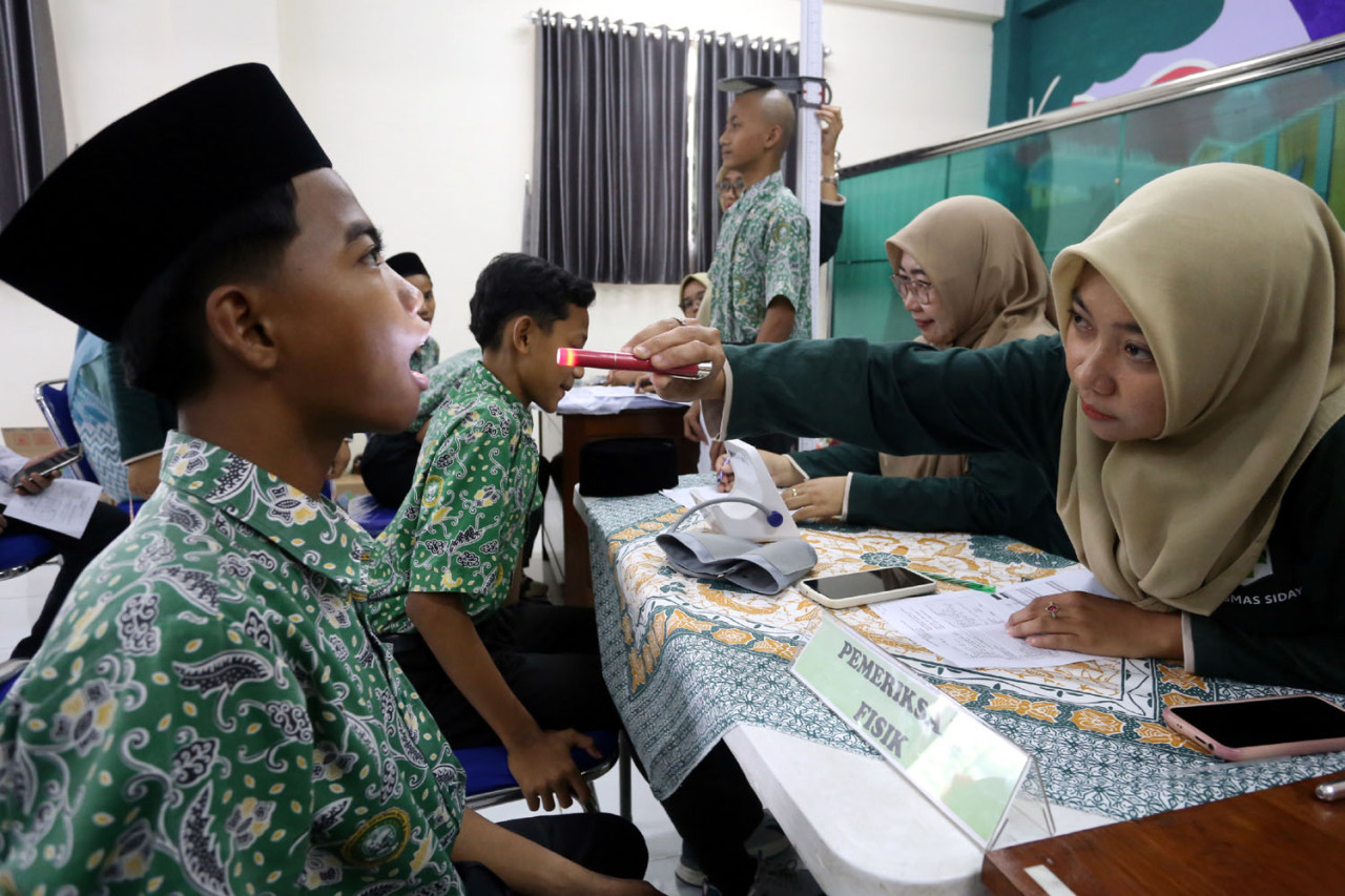 Foto: Menjaga Nafas Para Santri, Cek Kesehatan Gratis di Pondok Pesantren