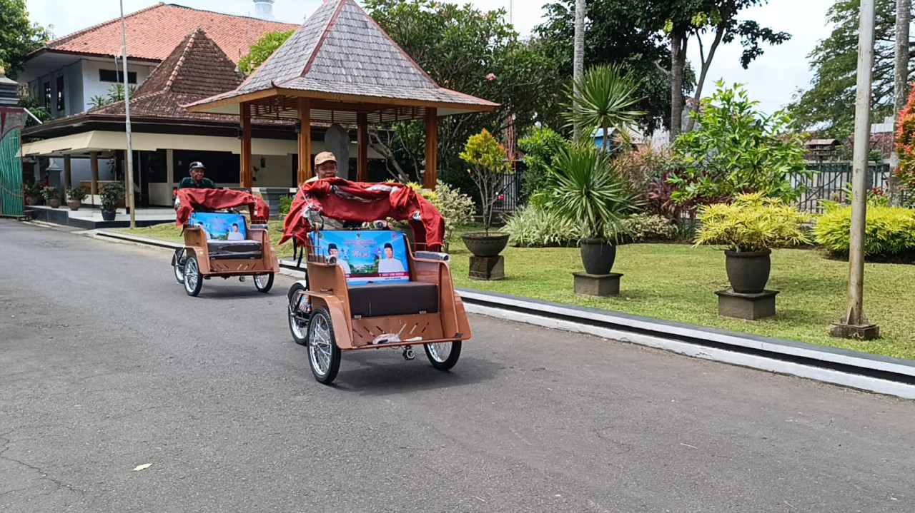 Foto: Becak listrik yang dibagikan ke warga Tulungagung. (Bramanta/jatimnow.com)