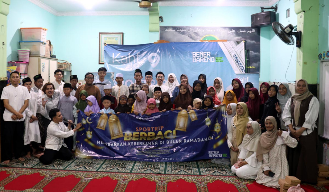 Sebanyak 60 anggota komunitas Sportrip terjun langsung ke Yayasan Panti Asuhan Al Hasyimi, Surabaya. (Foto: Humas Sportrip/jatimnow.com)