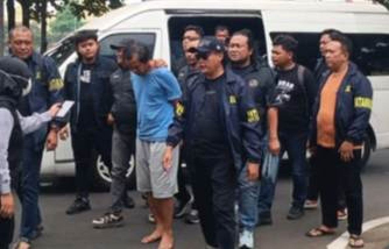 Terduga pelaku pembunuhan ibu dan anak di Madiun. (Foto: Sujianto/jatimnow.com)
