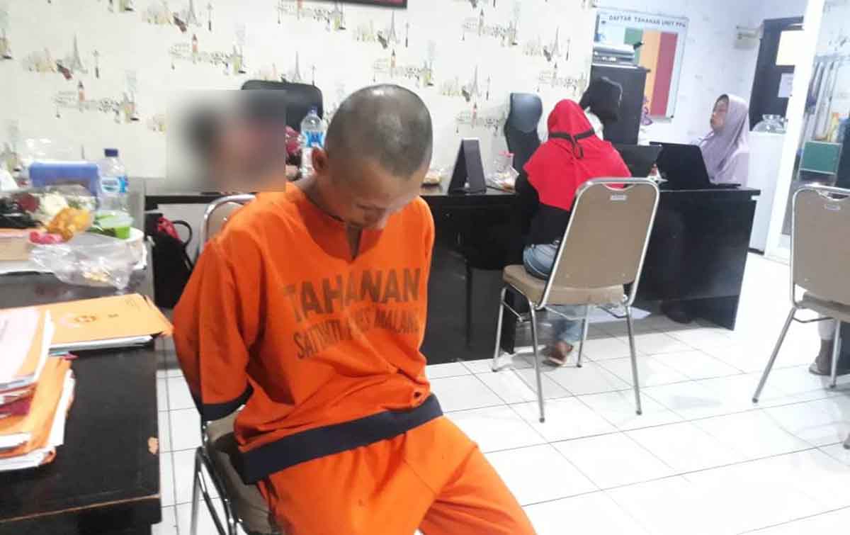 Tajab saat diamankan di Mapolres Malang