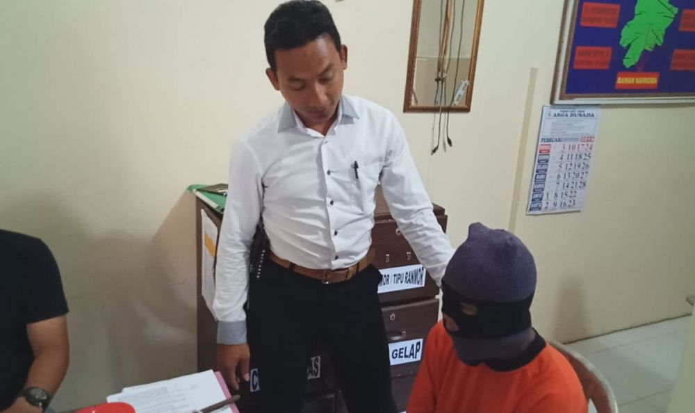 Tersangka Andri diamankan di Mapolsek Ngadiluwih Kediri