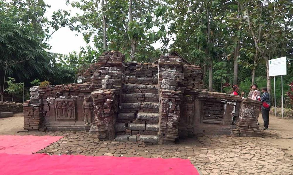Candi Minigambar, terletak di Desa Mirigambar, Kecamatan Sumbergempol, Kabupaten Tulungagung