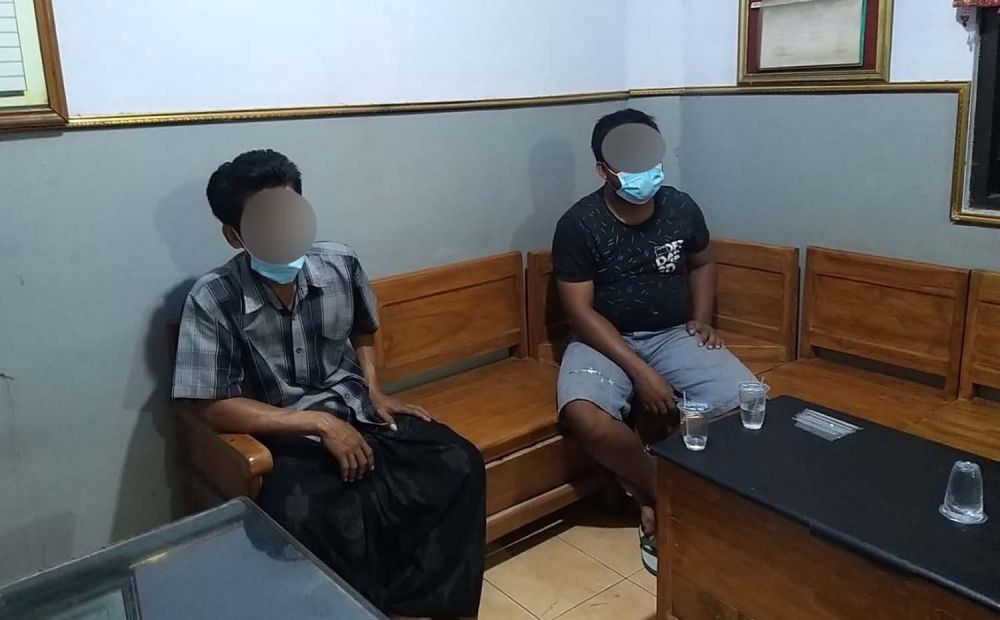 Dua orang diduga provokator kekacauan saat pemakaman jenazah pasien Covid-19 diamankan di Mapolres Pasuruan Kota