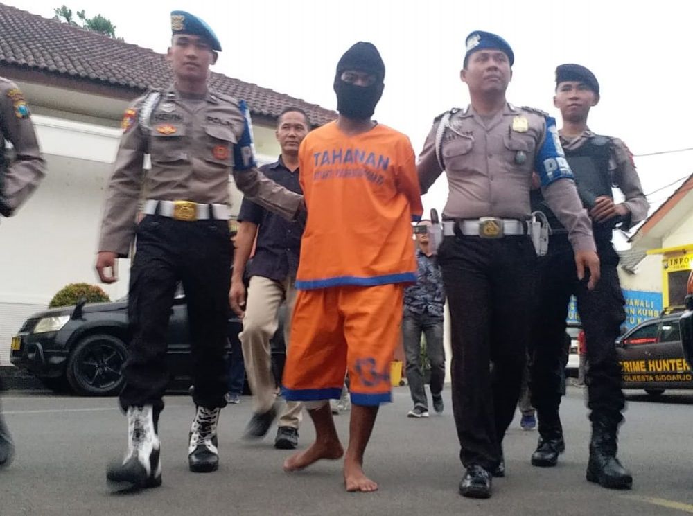 Pelaku yang ditembak kakinya oleh Polres Sidoarjo